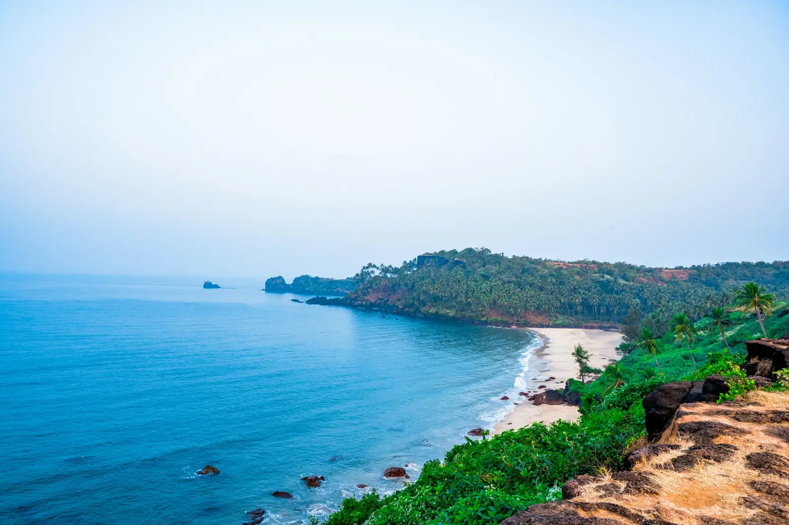 A Goa bay with a forested headland